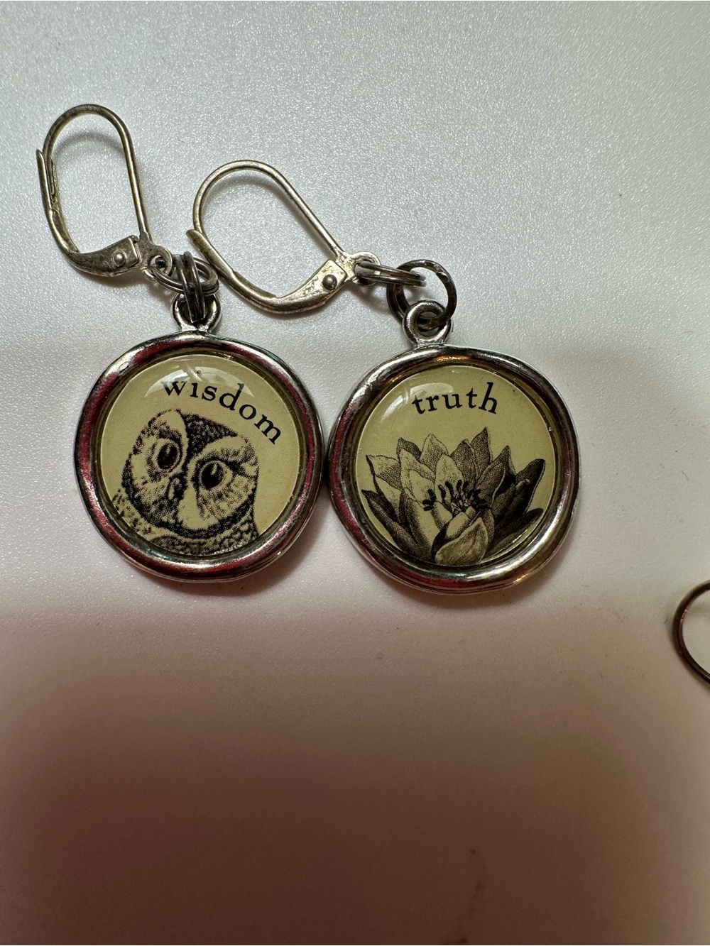 Silver-Tone 'Wisdom & Truth' Dangle Earrings with Cream and Black Motifs